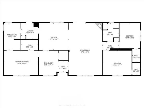 a picture of a room with a white wall and a refrigerator