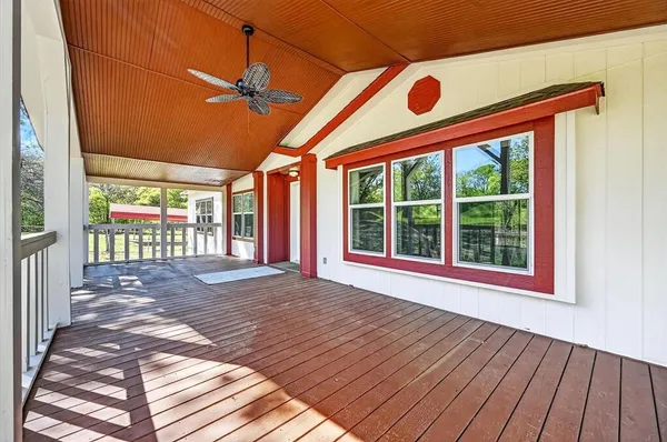 a front view of a house with a porch