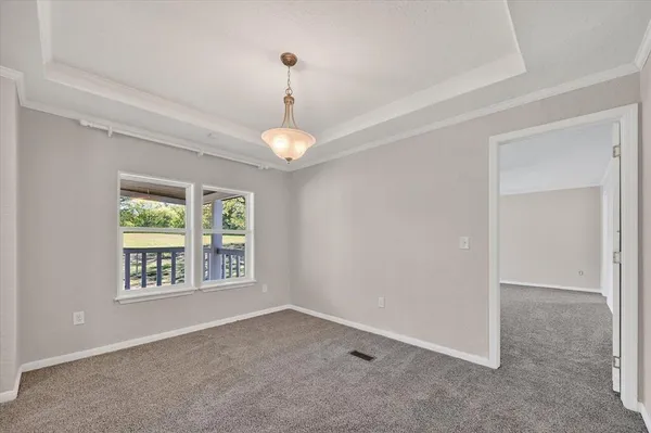 an empty room that has a window