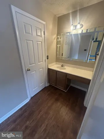 a view of a bathroom sink and mirror