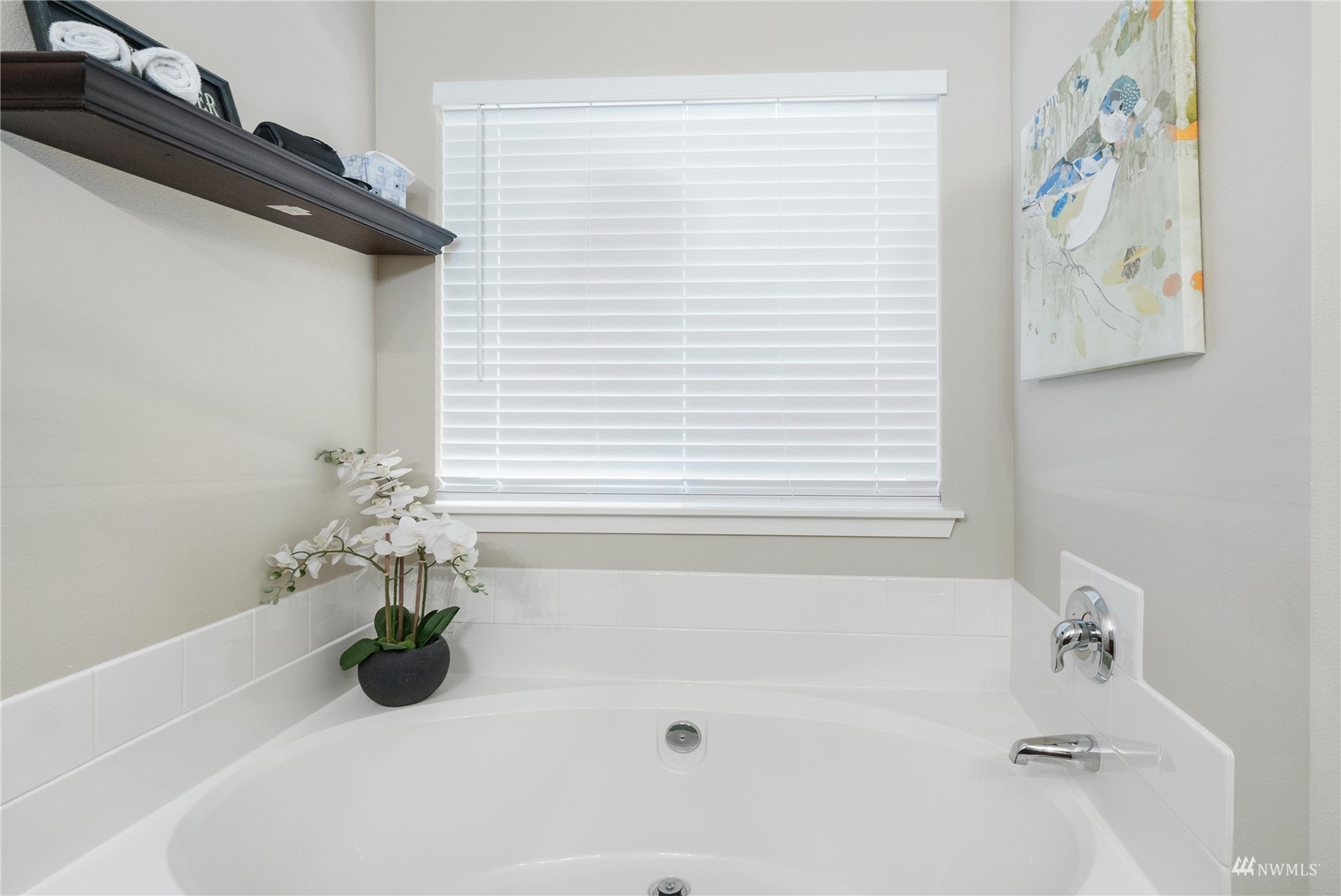 1333 Farina Loop Southeast Olympia, WA 98513 - Photo 30 of 32 a bath tub sitting in a bathroom next to a window