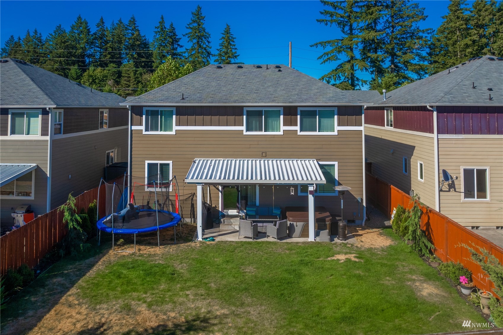 1333 Farina Loop Southeast Olympia, WA 98513 - Photo 31 of 32 a view of an house with backyard space and balcony