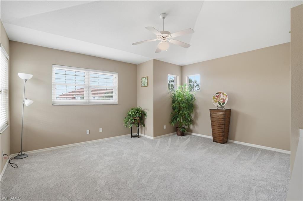 10871 Crooked River Road, Unit 202 Estero, FL 34135 - Photo 30 of 46 a view of an empty room with a window