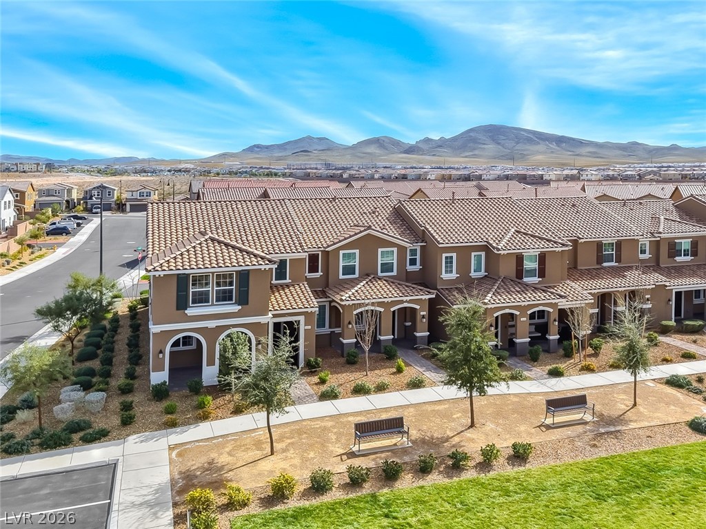 3564 Credere Lane Henderson, NV 89074 - Photo 1 of 40 View of front of house featuring stucco siding, a residential view, a mountain view, and a tile roof