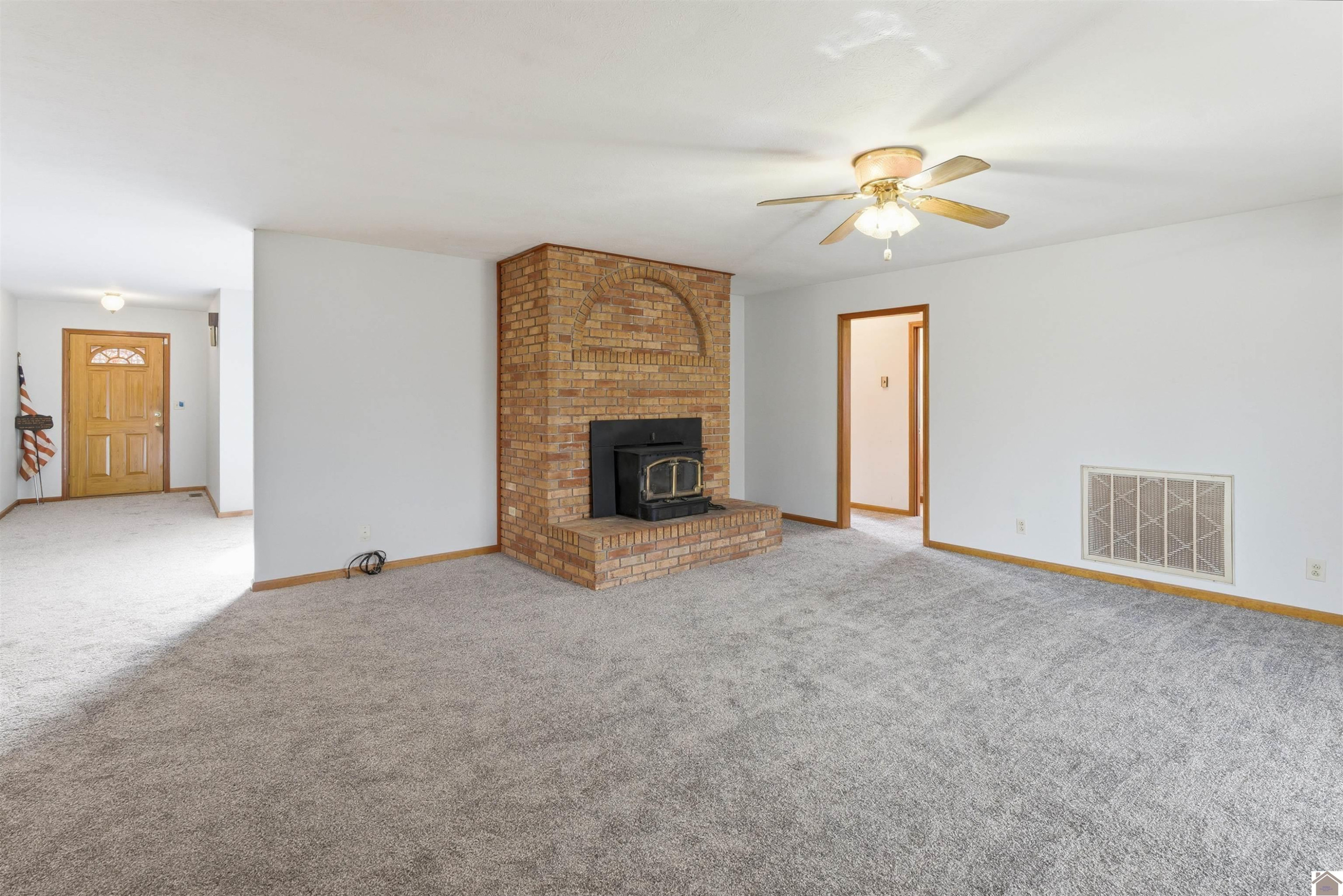 915 Jake Dukes Road Grand Rivers, KY 42045 - Photo 13 of 49 Livingroom with Woodstove