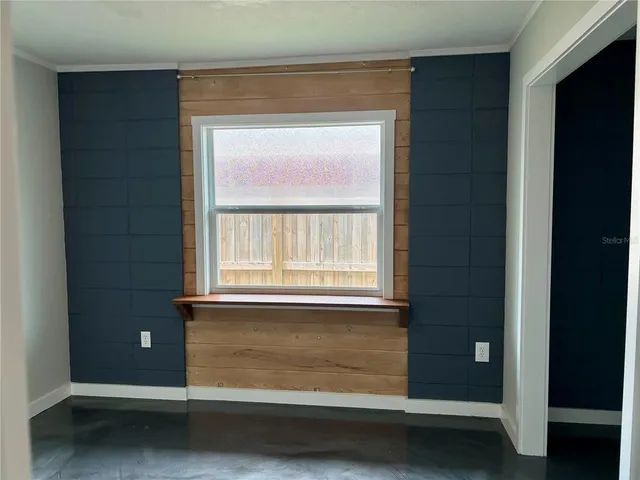 a view of entry way with wooden door
