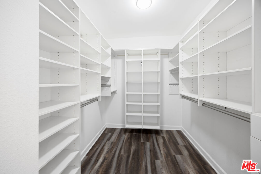 321 South San Vicente Boulevard, Unit 708 Los Angeles, CA 90048 - Photo 11 of 19 a view of walk in closet with empty racks