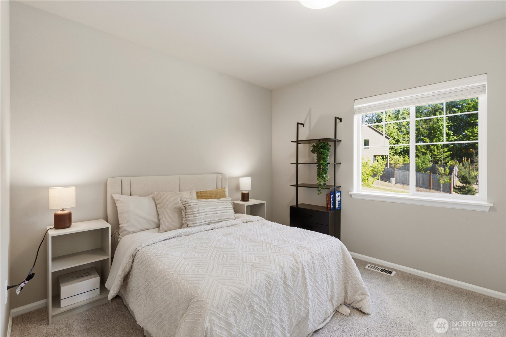 19432 9th Avenue Southeast Bothell, WA 98012 - Photo 22 of 33 a bedroom with a bed and a window
