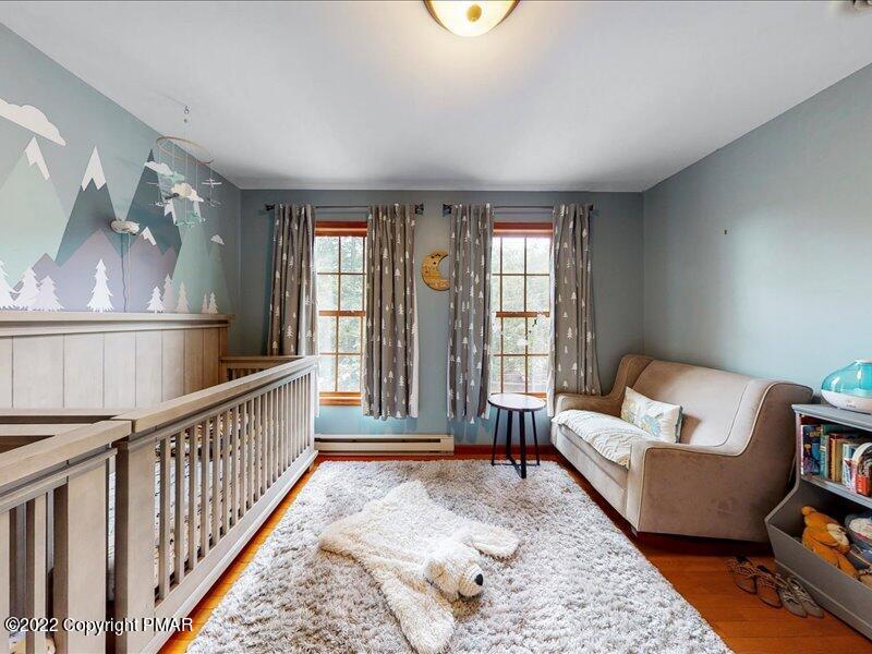 1080 Hampstead Road Bushkill, PA 18324 - Photo 31 of 62 a living room with furniture and a rug