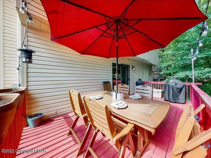 1080 Hampstead Road Bushkill, PA 18324 - Photo 40 of 62 an outdoor space with furniture and umbrella