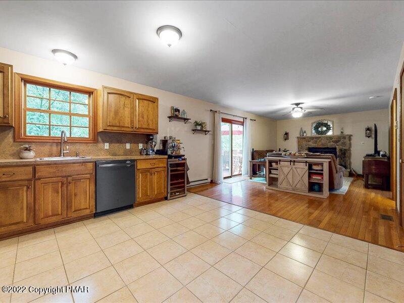 1080 Hampstead Road Bushkill, PA 18324 - Photo 8 of 62 a kitchen with stainless steel appliances a sink and counter space