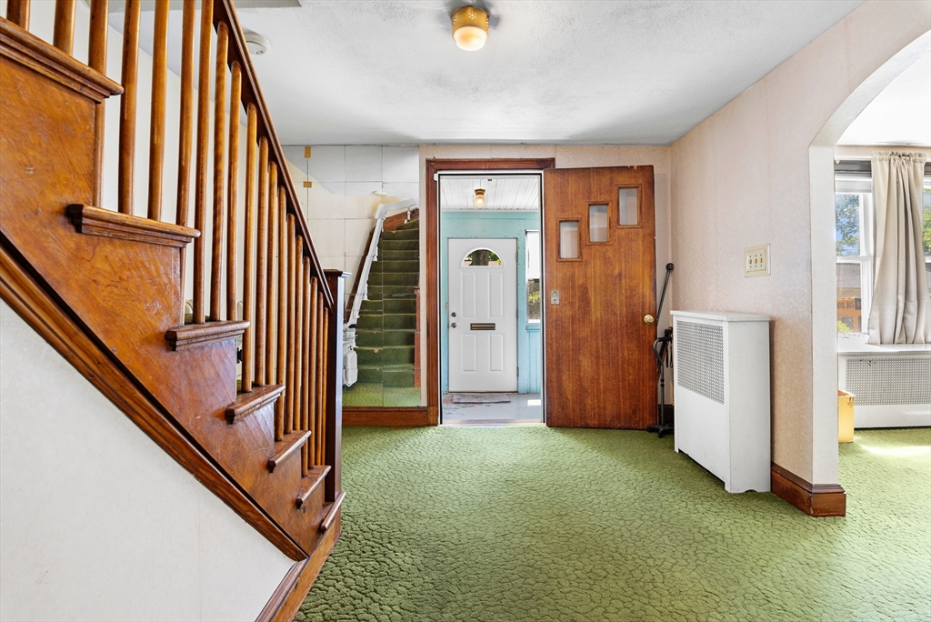27 Colorado Street Boston, MA 02126 - Photo 14 of 32 a view of an entryway with workspace