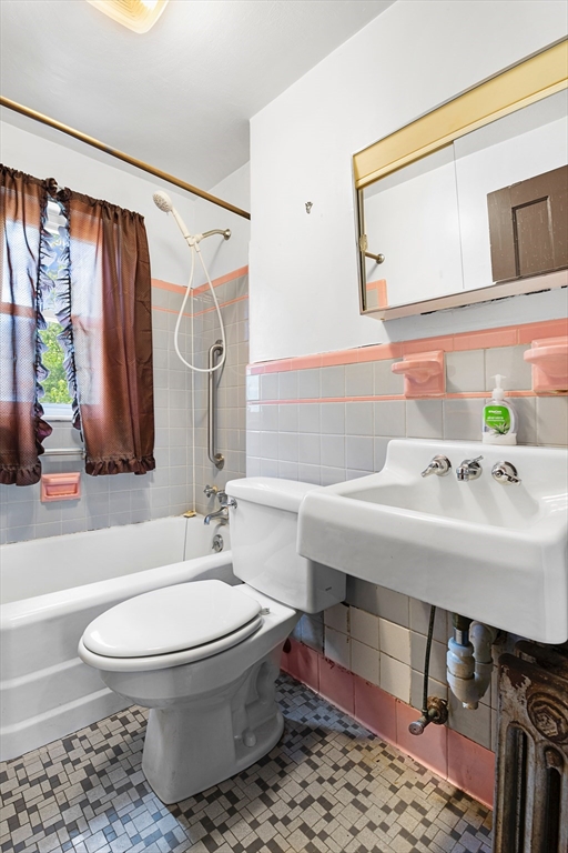 27 Colorado Street Boston, MA 02126 - Photo 23 of 32 a bathroom with a sink toilet and shower