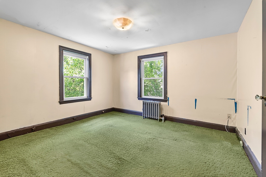 27 Colorado Street Boston, MA 02126 - Photo 30 of 32 an empty room with windows