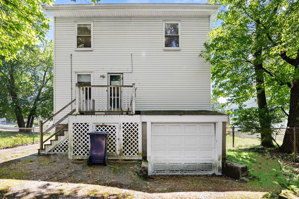 27 Colorado Street Boston, MA 02126 - Photo 8 of 32 a front view of a house with a yard