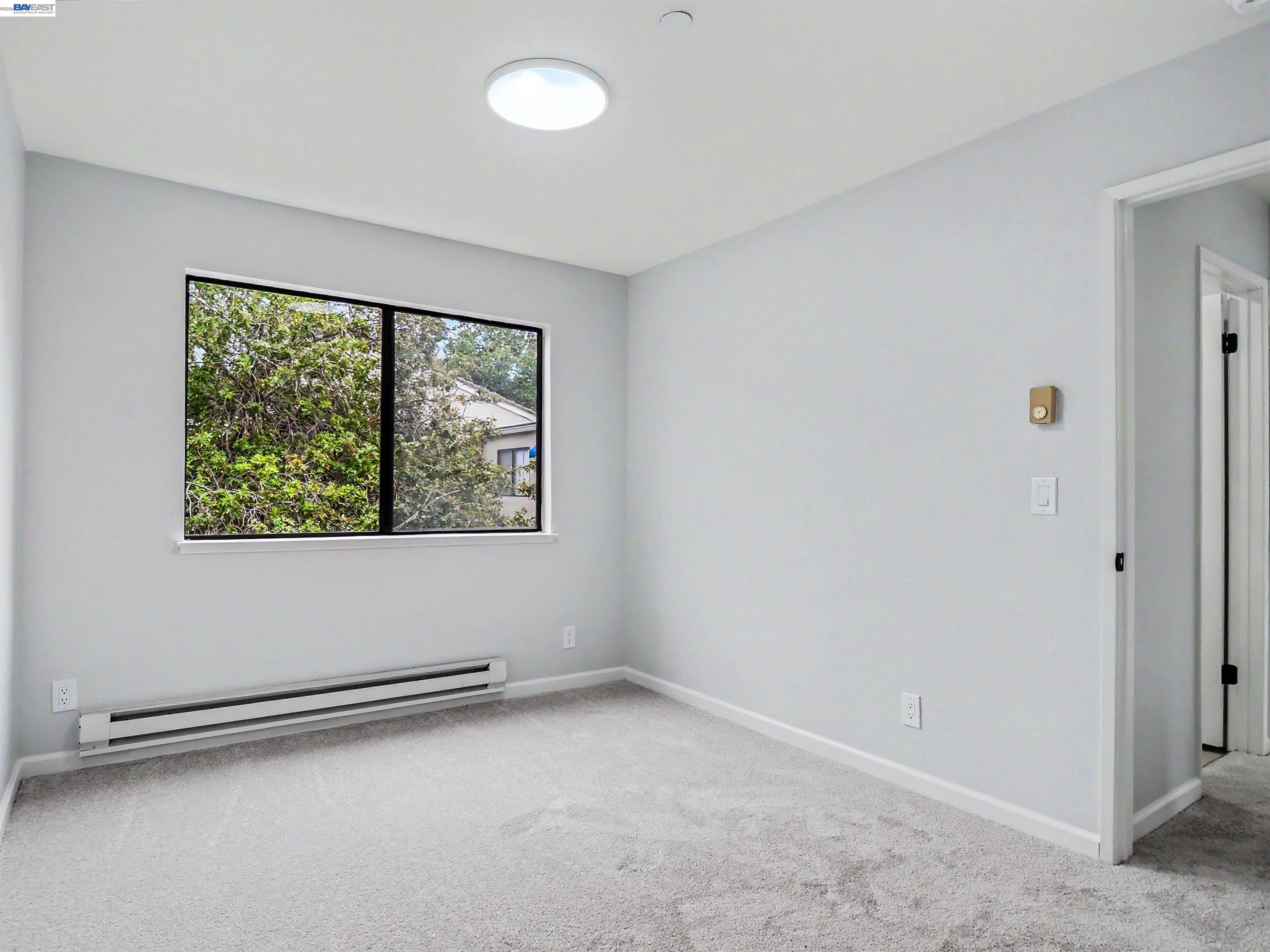 39450 Albany Common, Unit X Fremont, CA 94538 - Photo 14 of 46 an empty room with a window