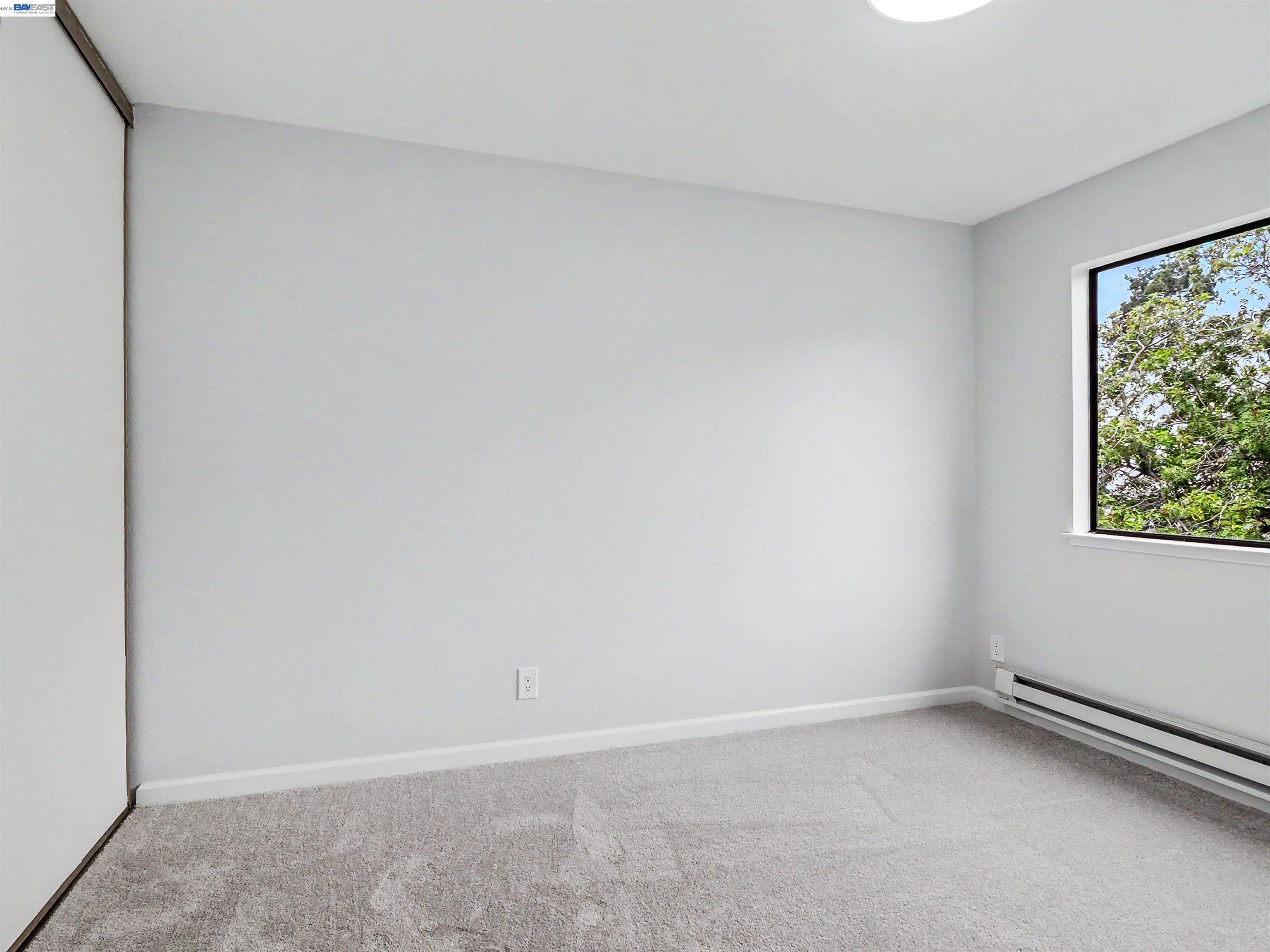 39450 Albany Common, Unit X Fremont, CA 94538 - Photo 16 of 46 an empty room with a window