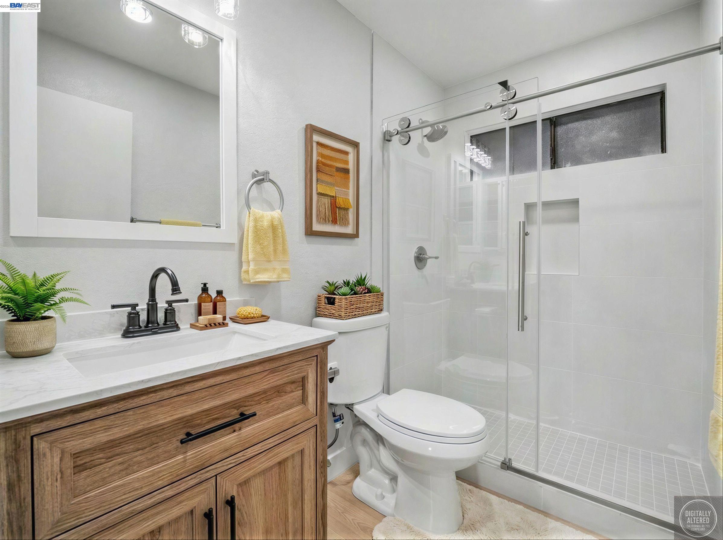 39450 Albany Common, Unit X Fremont, CA 94538 - Photo 17 of 46 a bathroom with a sink a toilet and shower