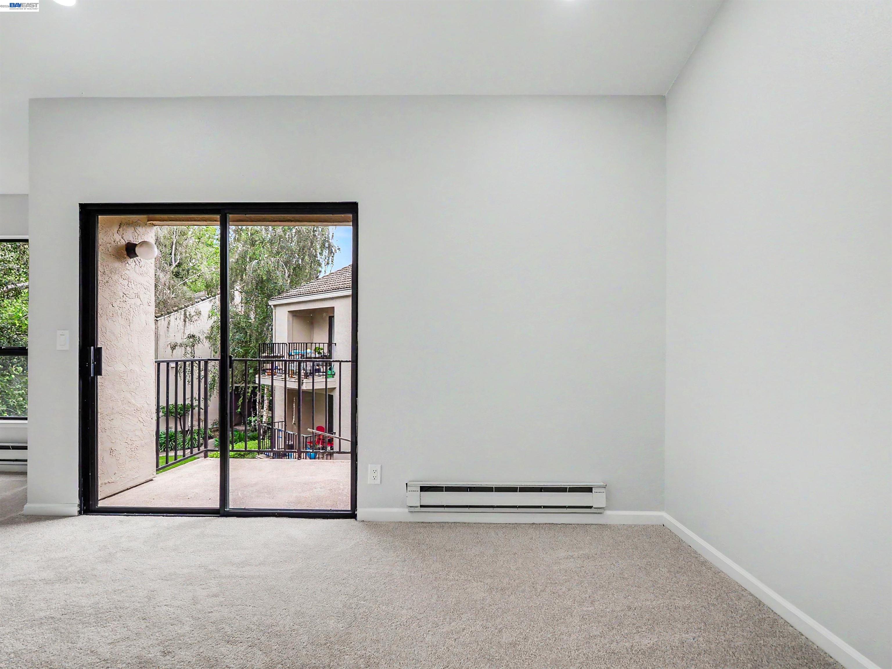 39450 Albany Common, Unit X Fremont, CA 94538 - Photo 22 of 46 a view of an empty room with a window