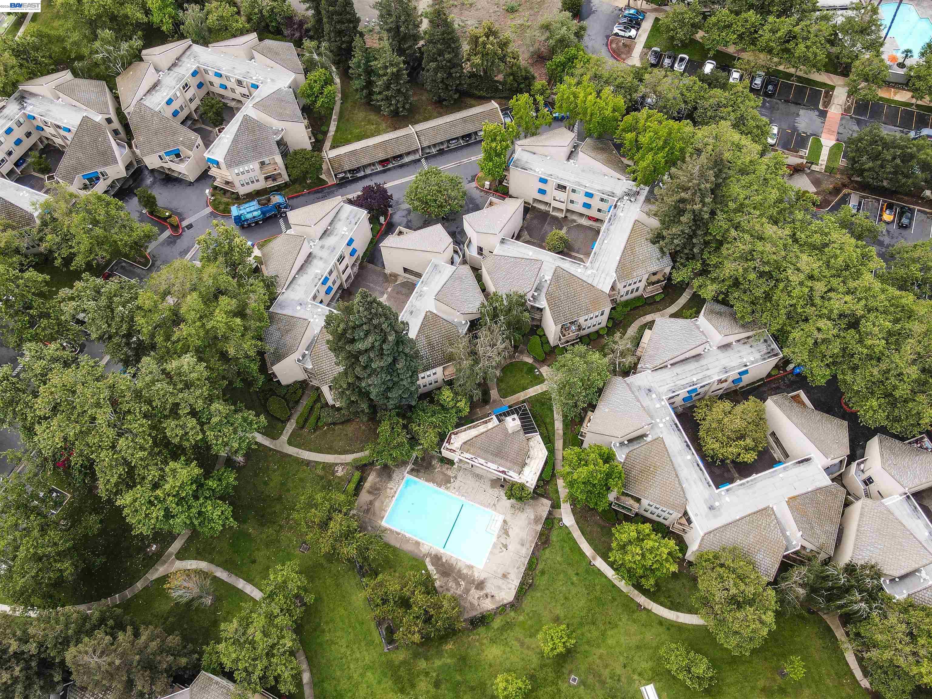 39450 Albany Common, Unit X Fremont, CA 94538 - Photo 39 of 46 an aerial view of residential house with outdoor space and swimming pool