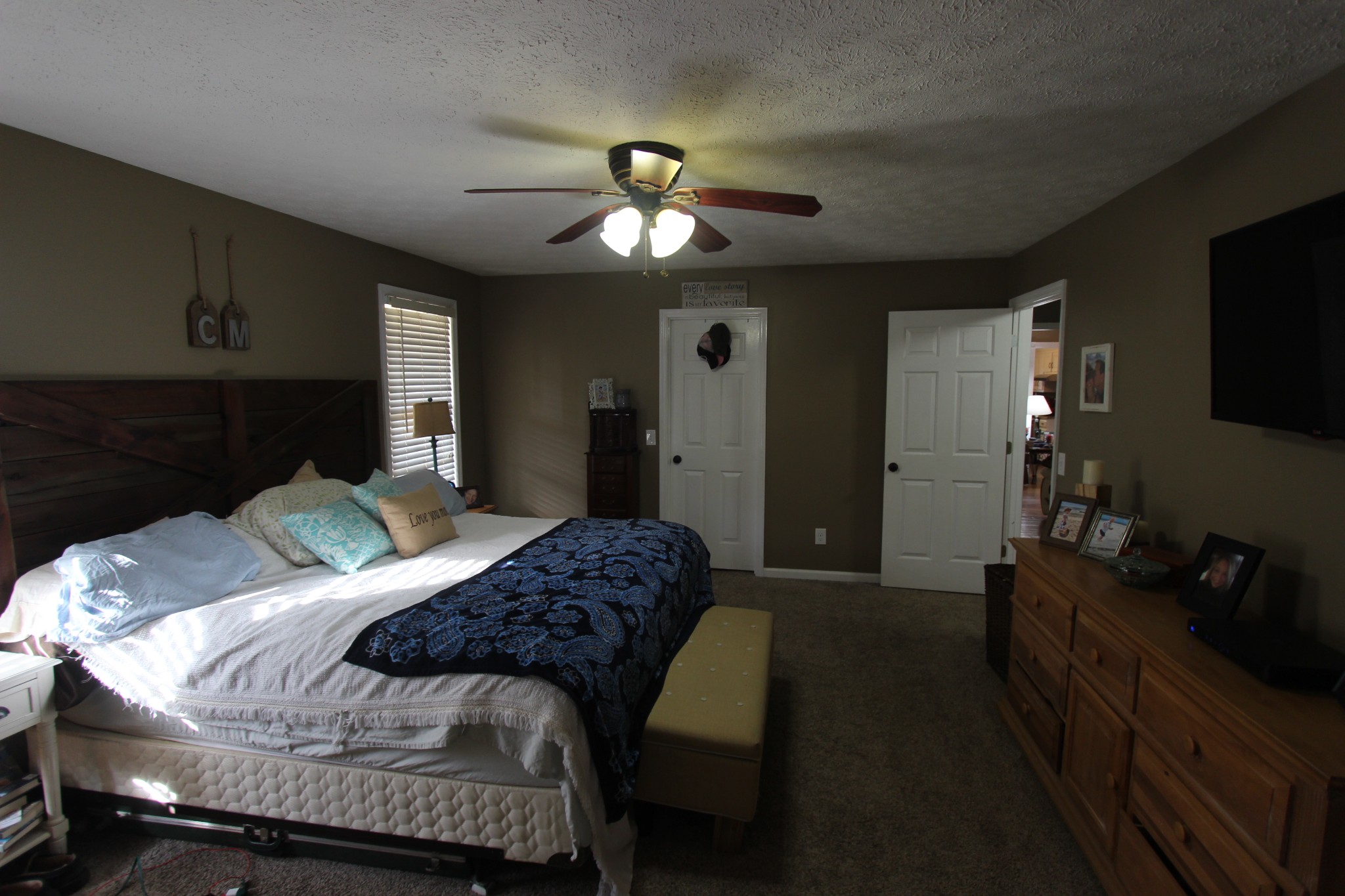 1360 Cedar Grove Road Lebanon, TN 37087 - Photo 15 of 29 a bedroom with a bed and a flat tv screen on a dresser