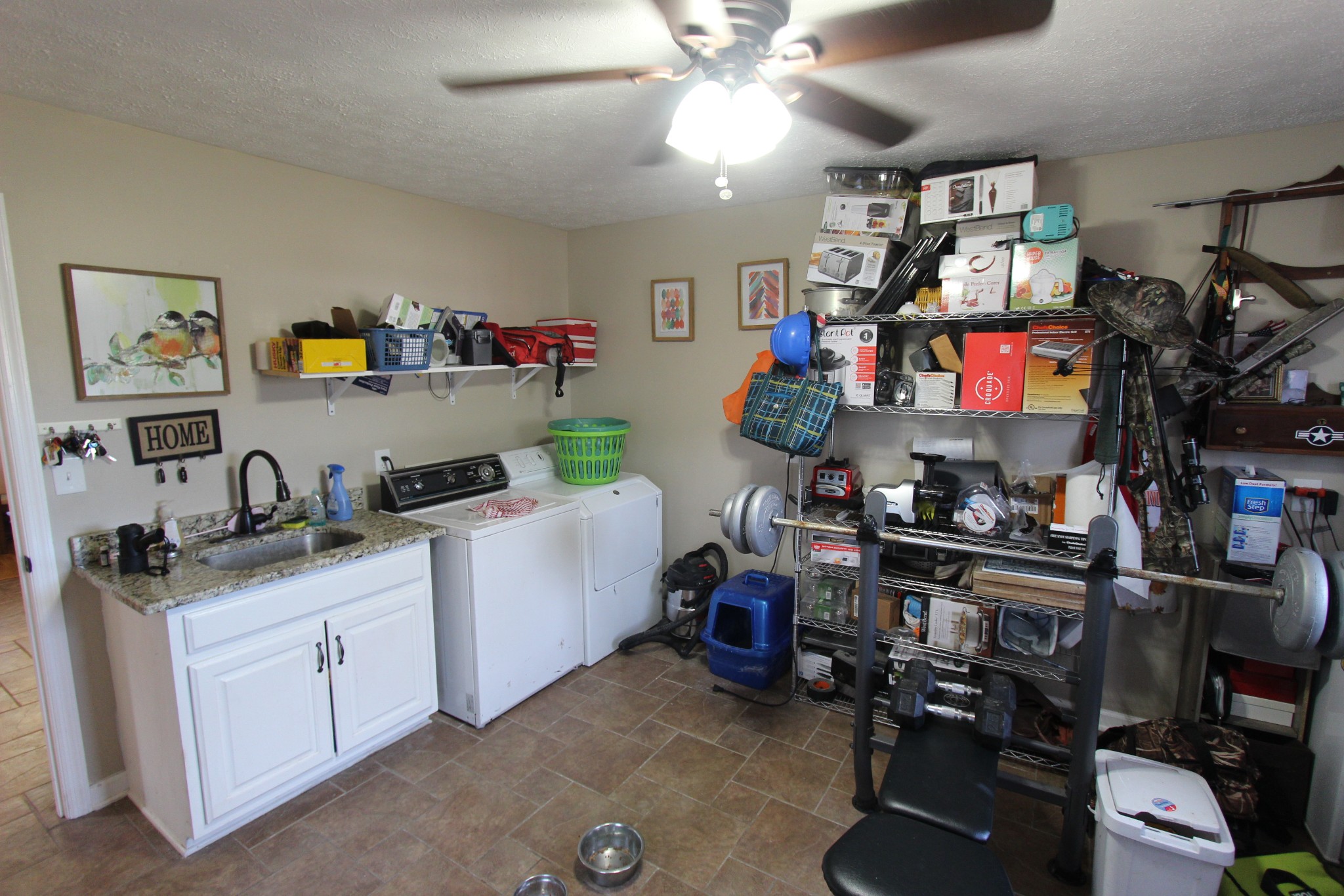 1360 Cedar Grove Road Lebanon, TN 37087 - Photo 21 of 29 a kitchen that has a lot of cabinets and appliances