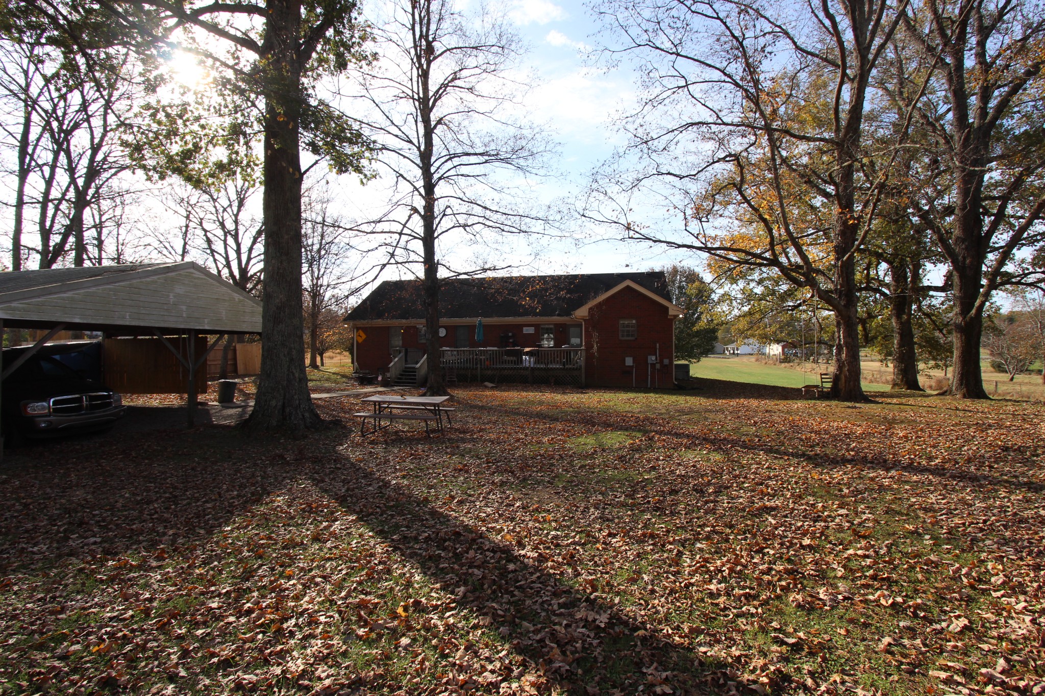 1360 Cedar Grove Road Lebanon, TN 37087 - Photo 29 of 29 a view of a house with a yard covered in the forest