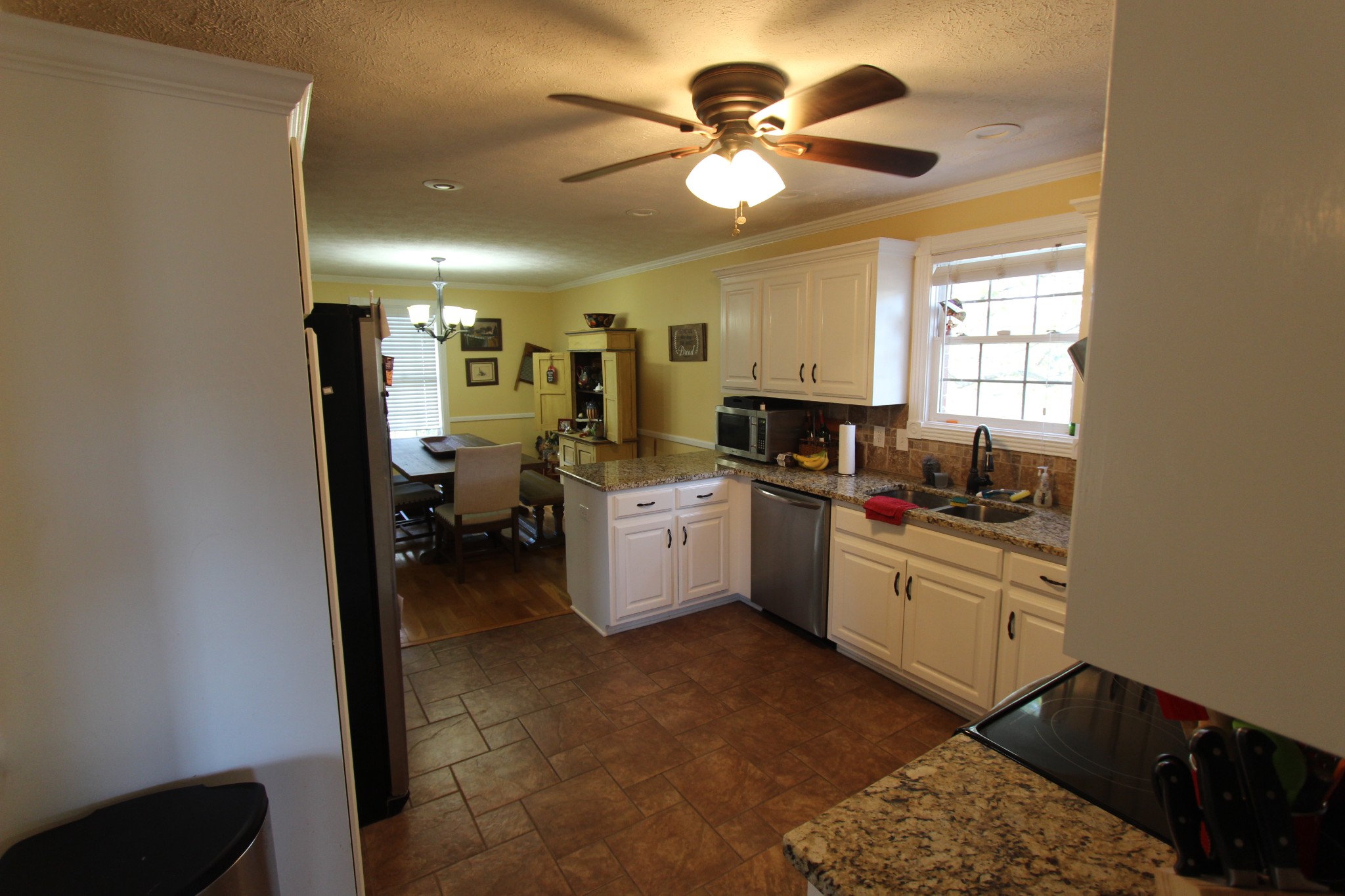1360 Cedar Grove Road Lebanon, TN 37087 - Photo 6 of 29 a kitchen with a sink cabinets and window