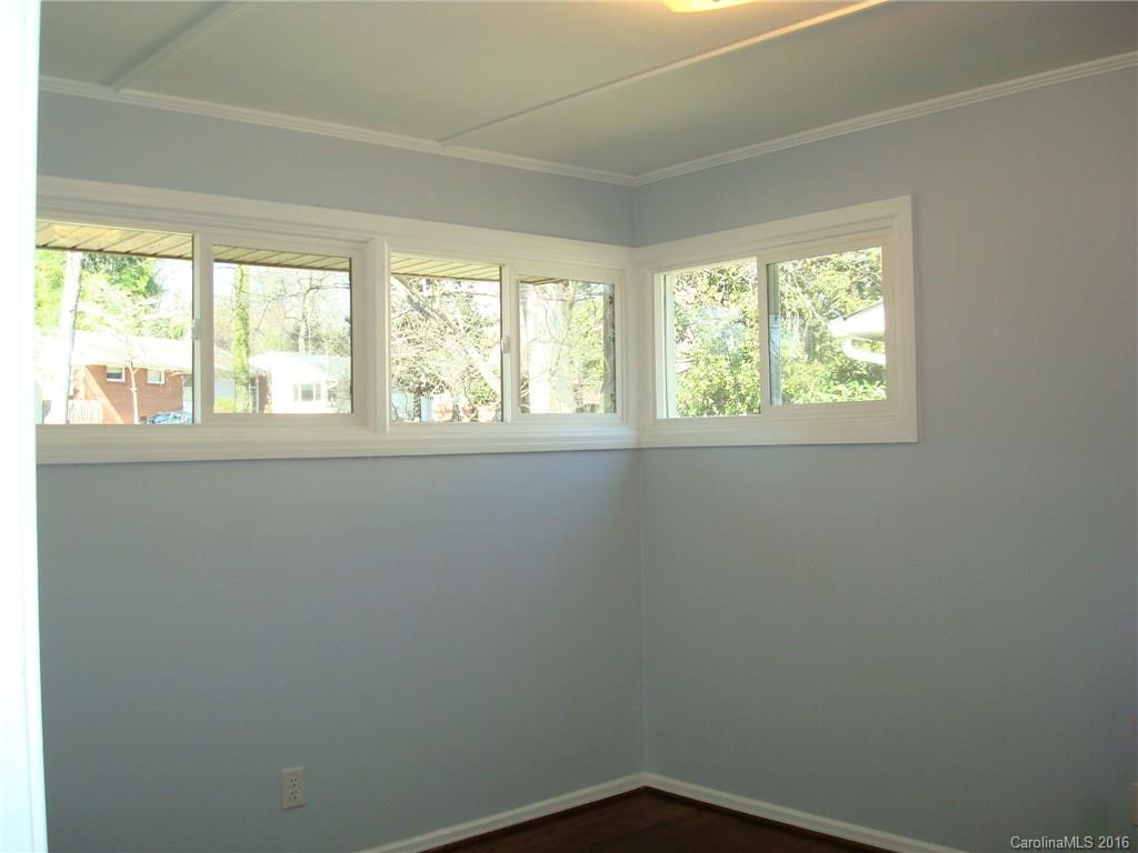 744 Manhasset Road Charlotte, NC 28209 - Photo 14 of 20 an empty room with a window