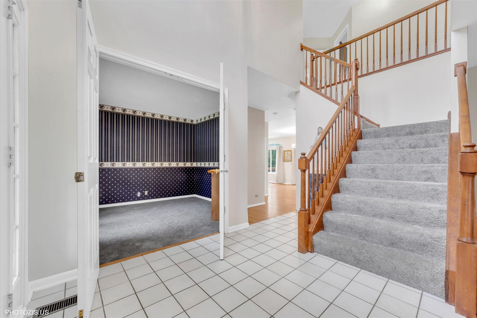 1034 Heather Court Fox River Grove, IL 60021 - Photo 18 of 64 a view of staircase with white walls and a window