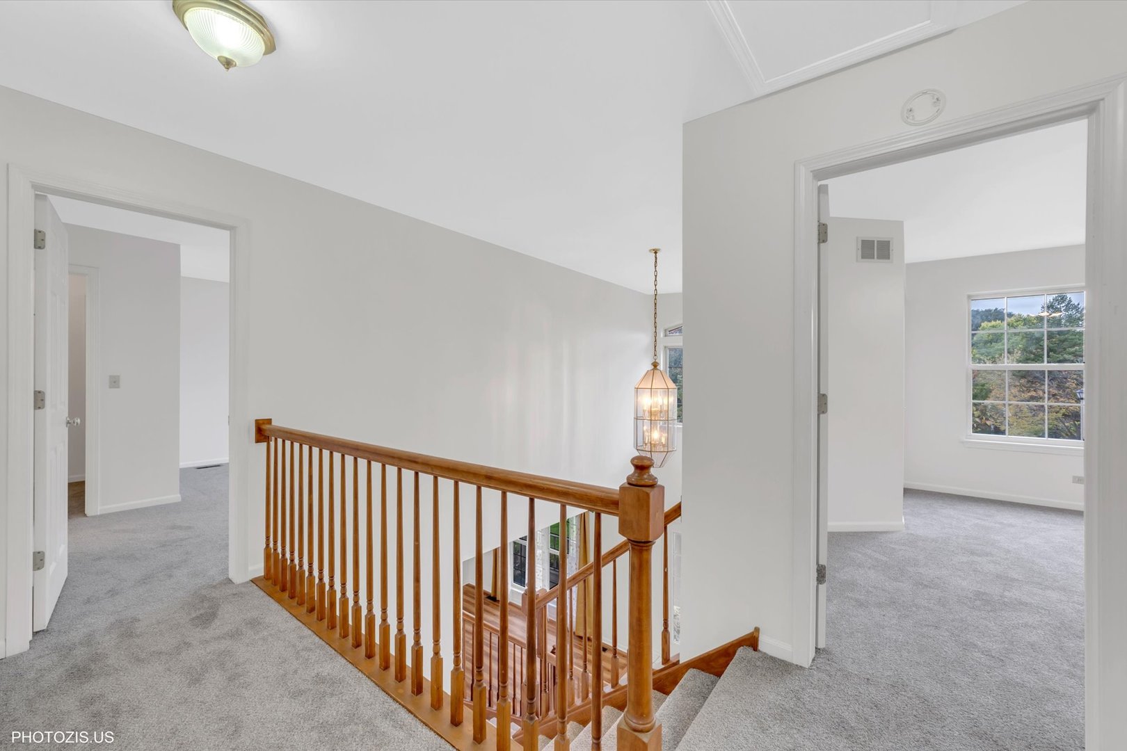 1034 Heather Court Fox River Grove, IL 60021 - Photo 20 of 64 a view of a hallway to rooms and stairs