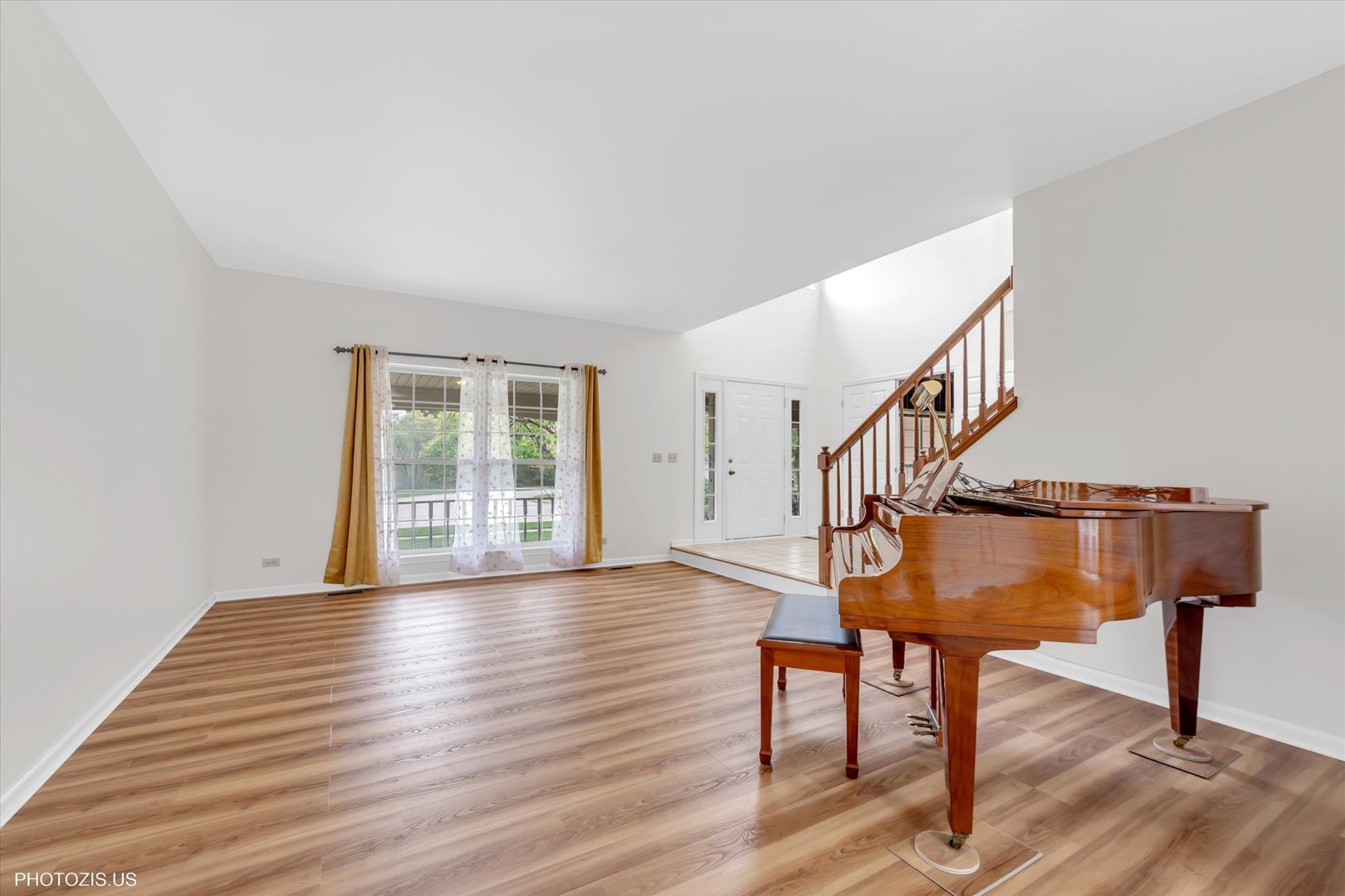 1034 Heather Court Fox River Grove, IL 60021 - Photo 3 of 64 a view of entryway with wooden floor and stairs