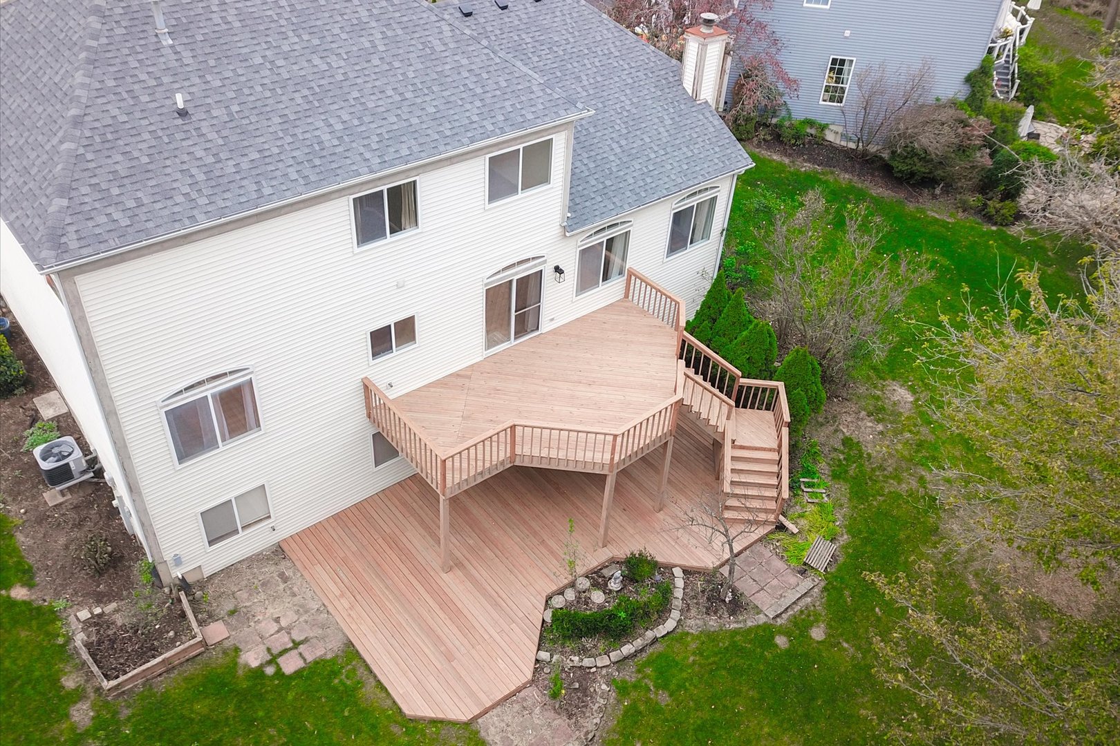 1034 Heather Court Fox River Grove, IL 60021 - Photo 54 of 64 a aerial view of a house with a yard and potted plants