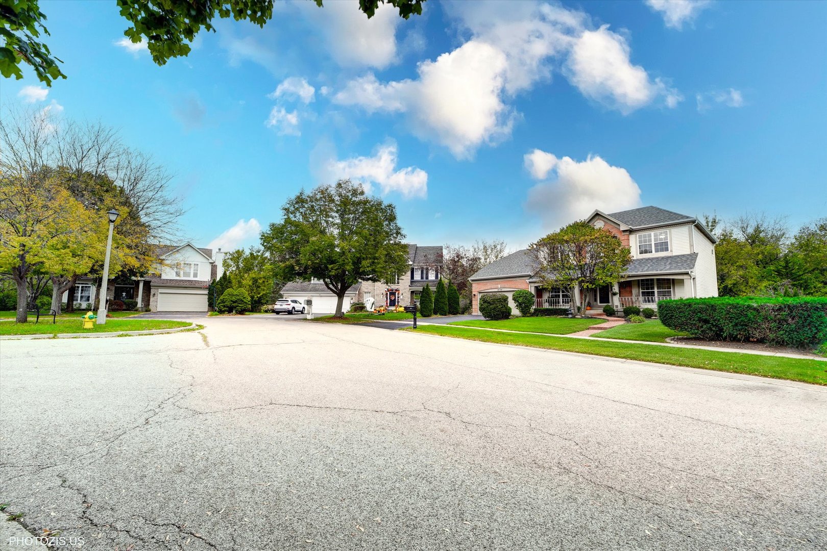 1034 Heather Court Fox River Grove, IL 60021 - Photo 61 of 64 a view of a house with a big yard and large trees