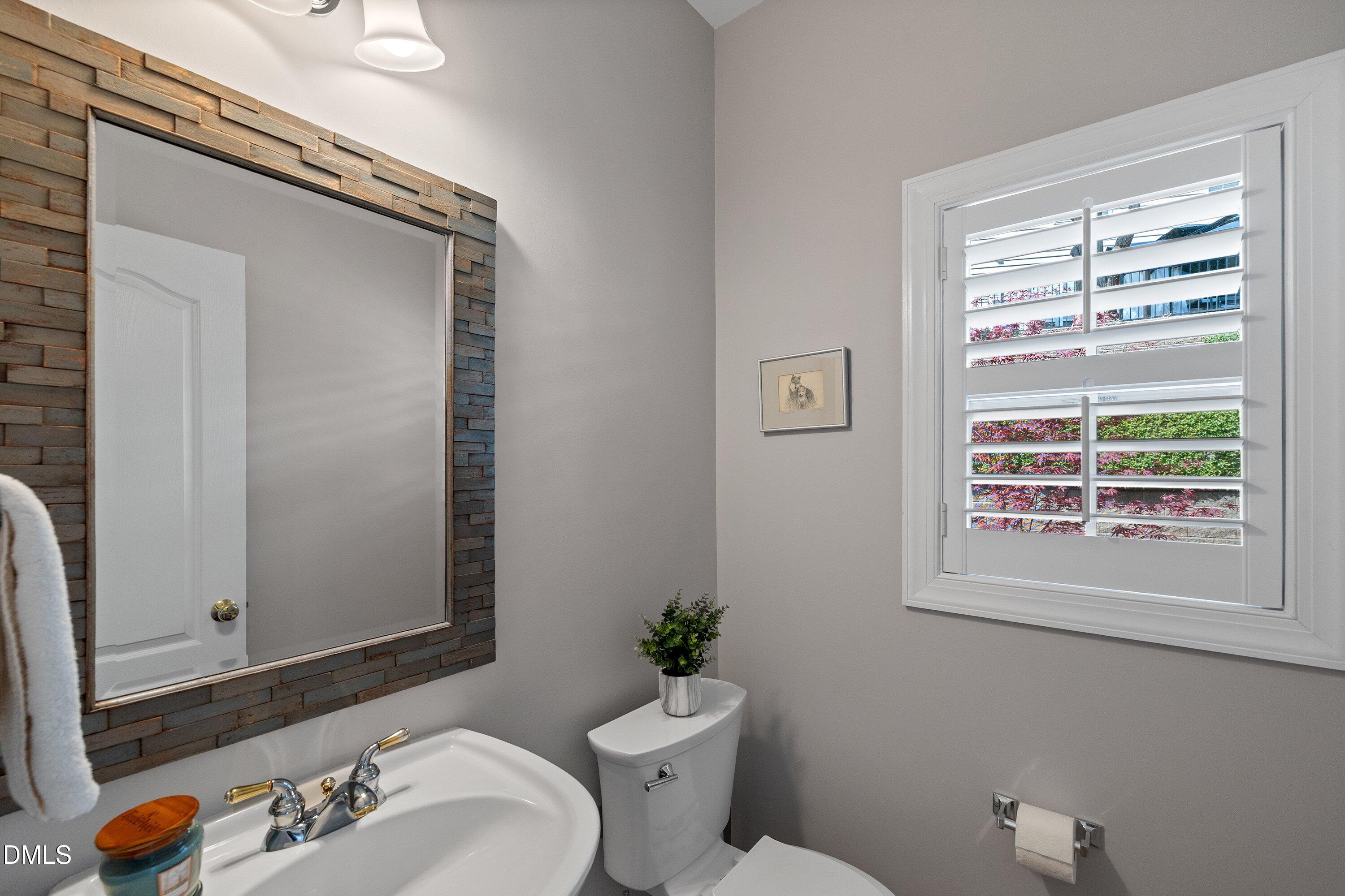 12241 Orchardgrass Lane Raleigh, NC 27614 - Photo 13 of 55 1st floor half bath