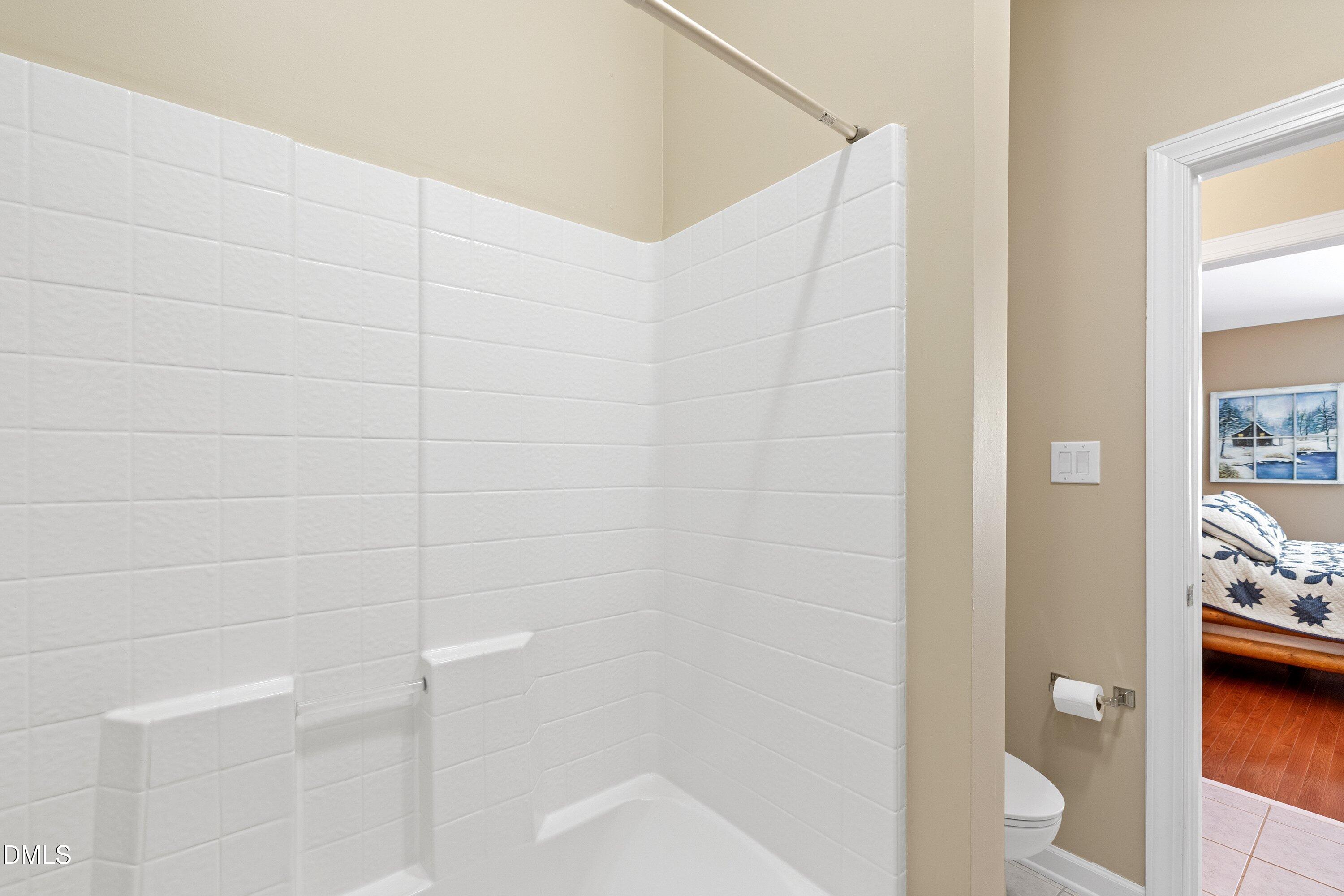 12241 Orchardgrass Lane Raleigh, NC 27614 - Photo 35 of 55 Tub with shower