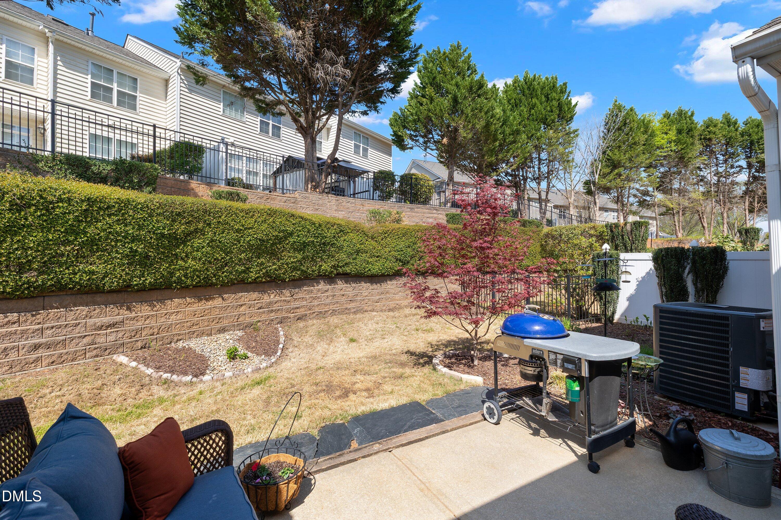 12241 Orchardgrass Lane Raleigh, NC 27614 - Photo 43 of 55 Patio to backyard