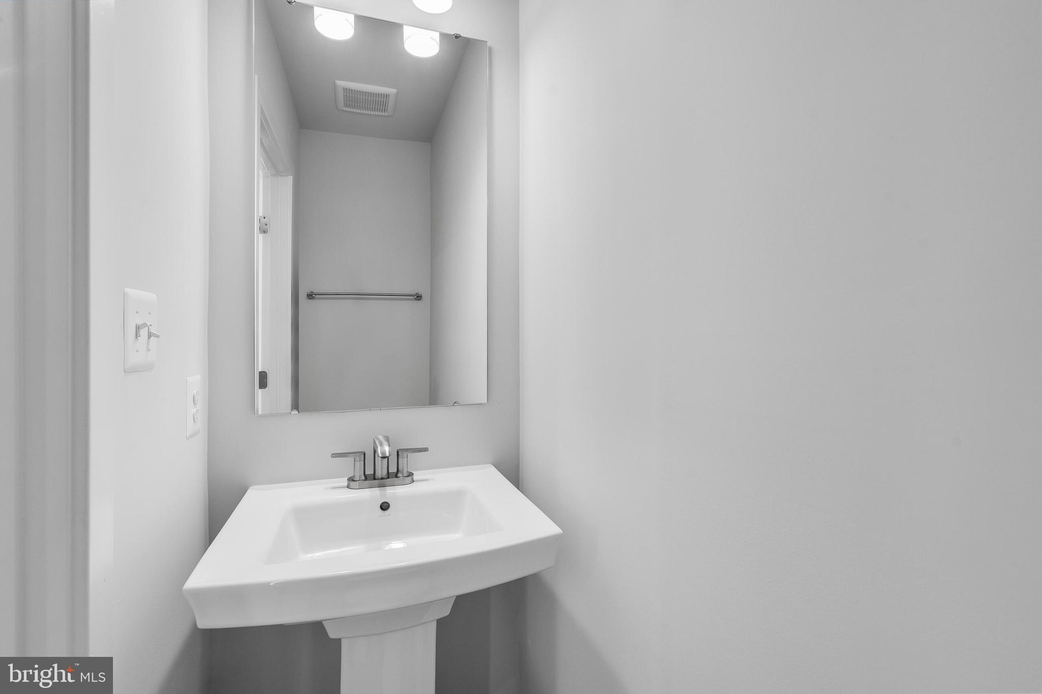 8515 Branch Side Way, Unit ST2001B Brandywine, MD 20613 - Photo 11 of 31 MAIN LEVEL - POWDER ROOM