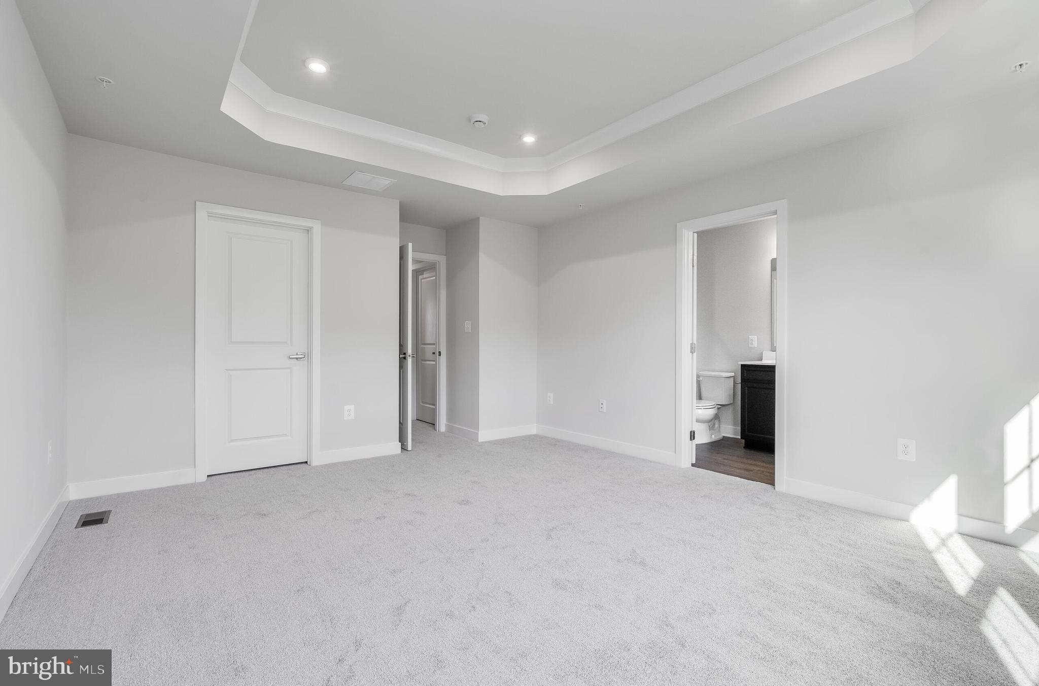 8515 Branch Side Way, Unit ST2001B Brandywine, MD 20613 - Photo 28 of 31 PRIMARY BEDROOM W/TRAY CEILING W/ LED LIGHTS