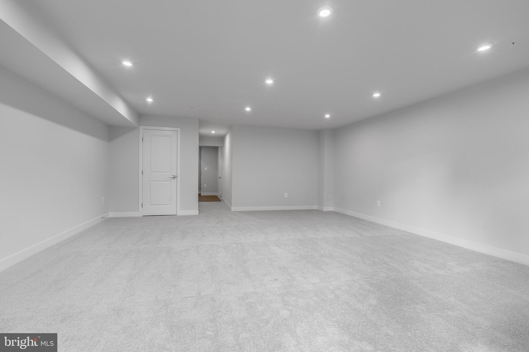 8515 Branch Side Way, Unit ST2001B Brandywine, MD 20613 - Photo 9 of 31 LOWER LEVEL RECREATION ROOM