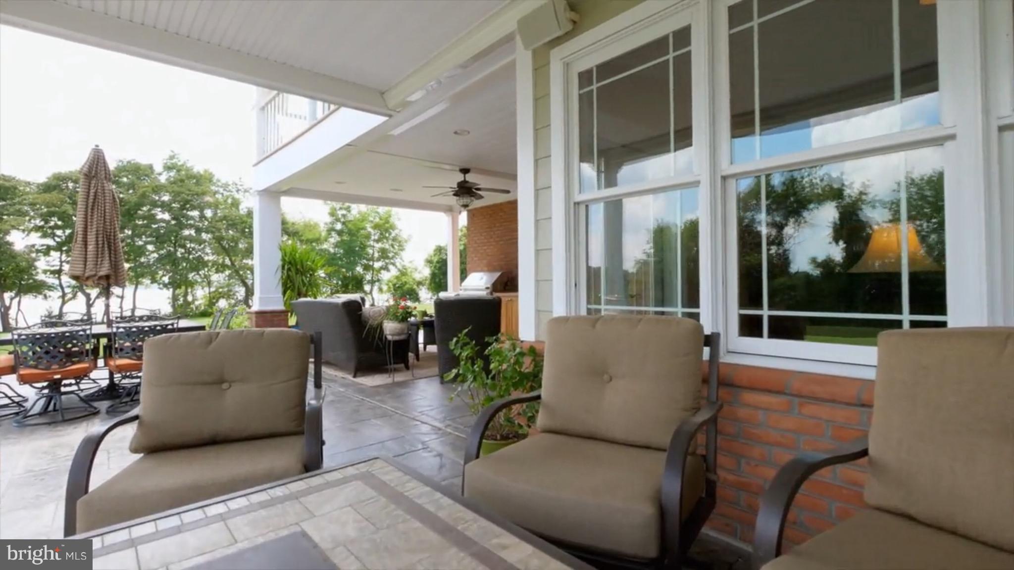 3380 Soper Road Huntingtown, MD 20639 - Photo 20 of 28 a building outdoor space with patio furniture
