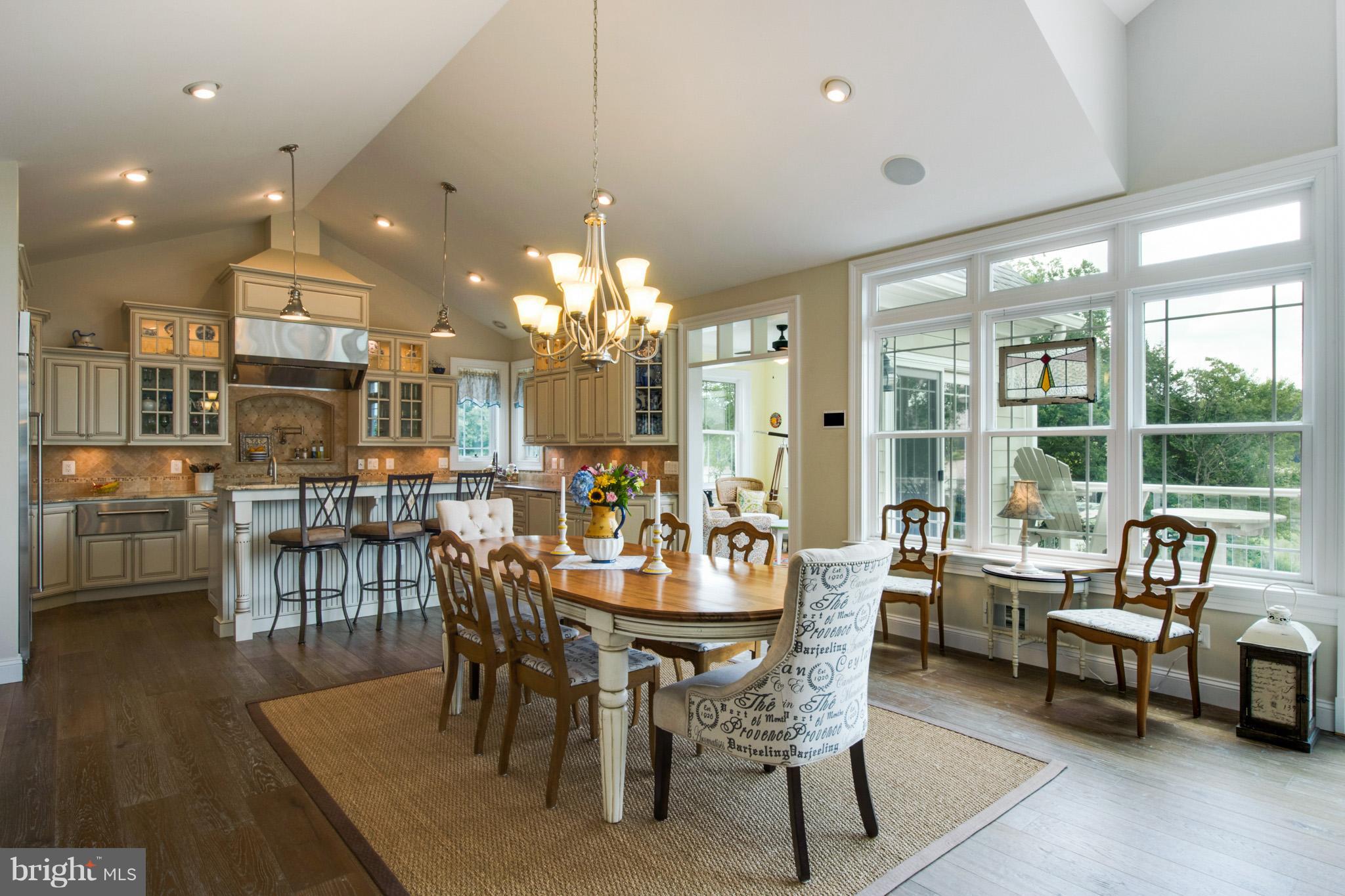 3380 Soper Road Huntingtown, MD 20639 - Photo 28 of 28 a view of a dining room with furniture window and wooden floor