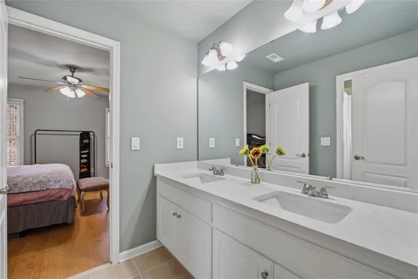 a picture of a bathroom with a shower