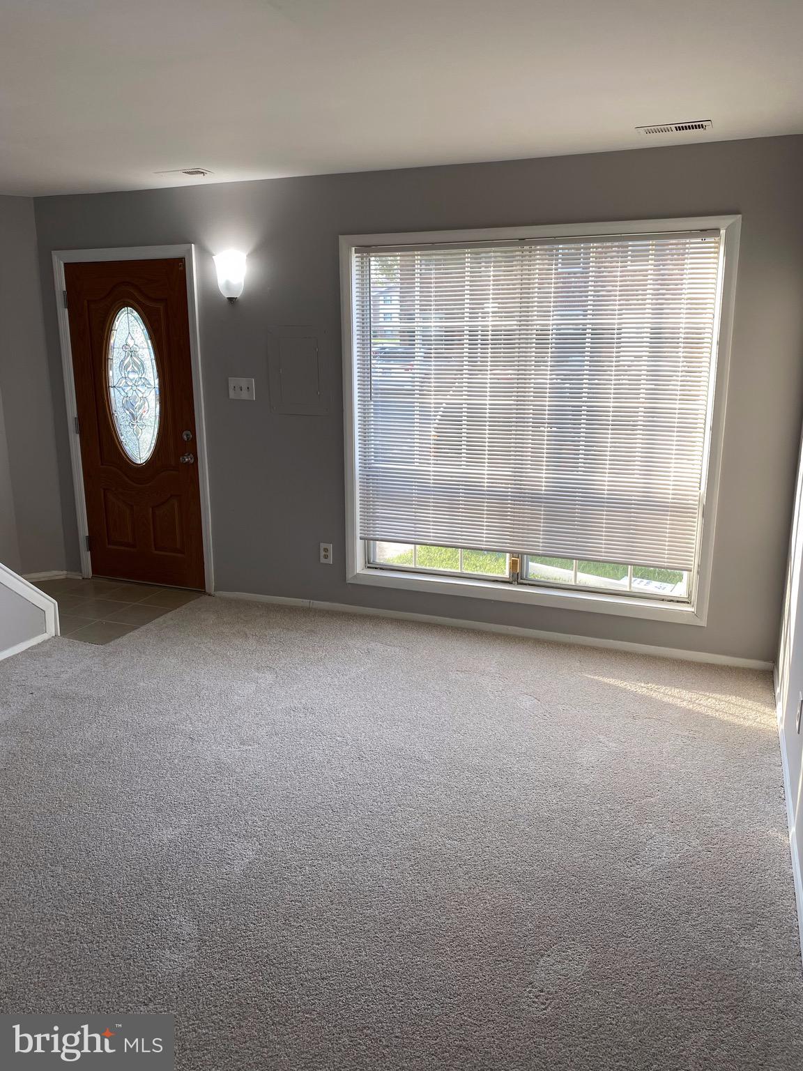 8807 Trimble Way Baltimore, MD 21237 - Photo 2 of 32 Living Room from inside home with new carpeting