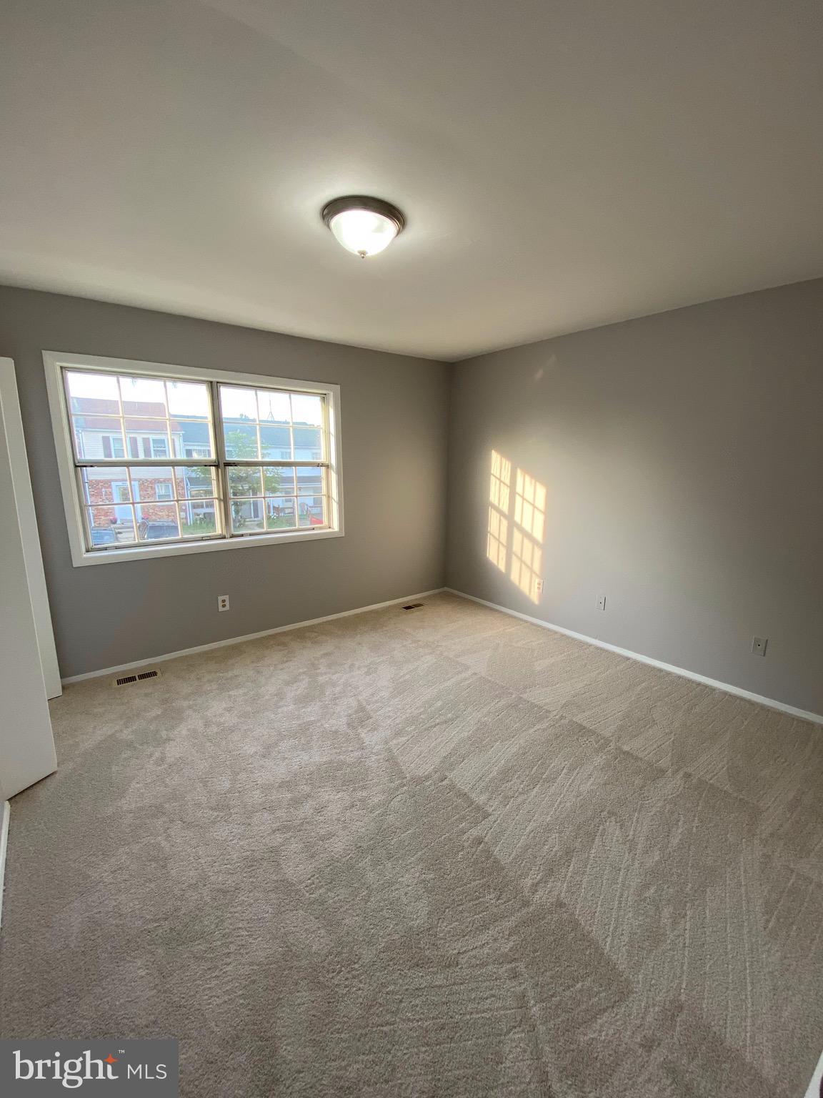 8807 Trimble Way Baltimore, MD 21237 - Photo 14 of 32 1st bedroom view with lots of natural lighting