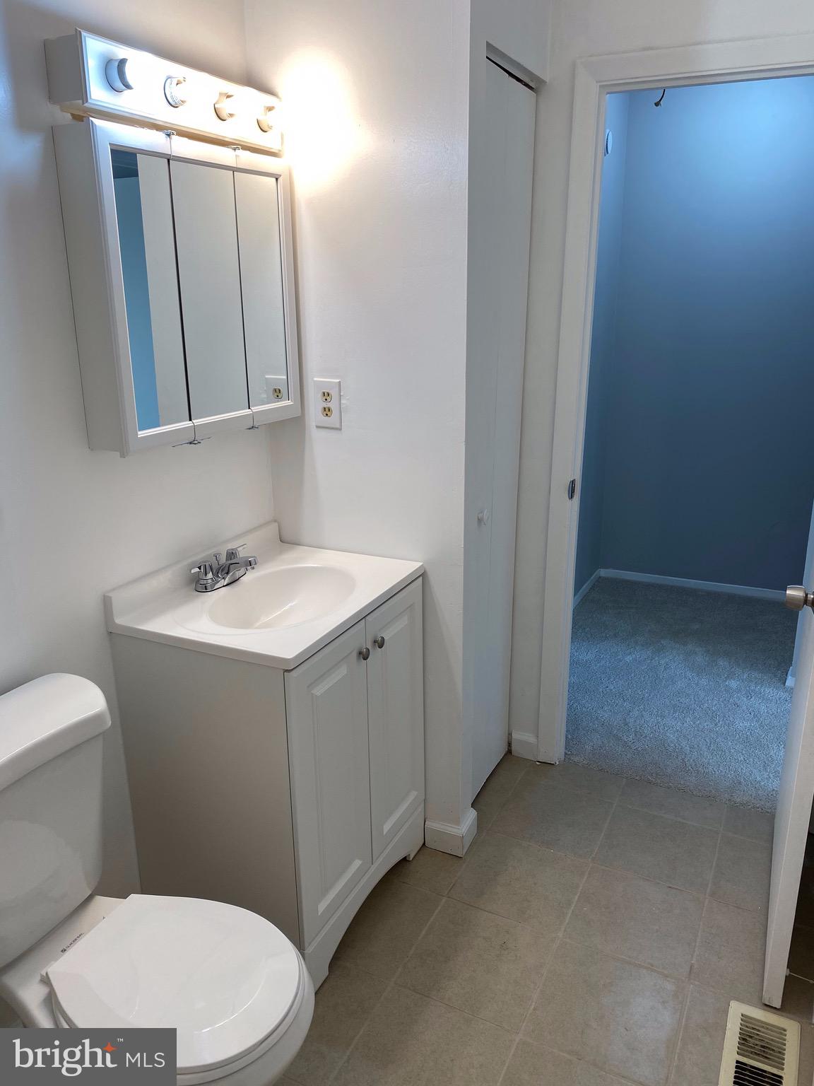 8807 Trimble Way Baltimore, MD 21237 - Photo 17 of 32 Bathroom view with new ceramic tile