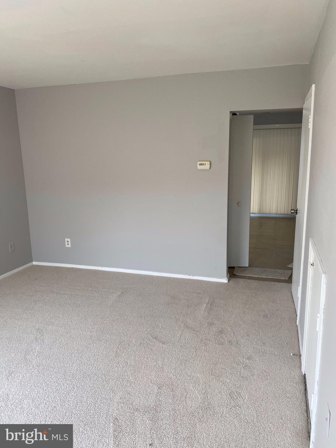 8807 Trimble Way Baltimore, MD 21237 - Photo 4 of 32 Spacious room with freshly painted walls