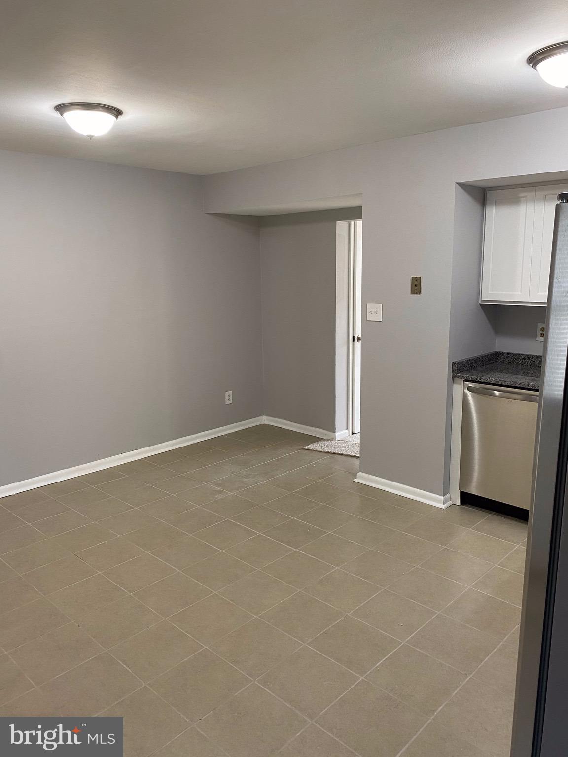 8807 Trimble Way Baltimore, MD 21237 - Photo 8 of 32 Third view of nice ea- in kitchen