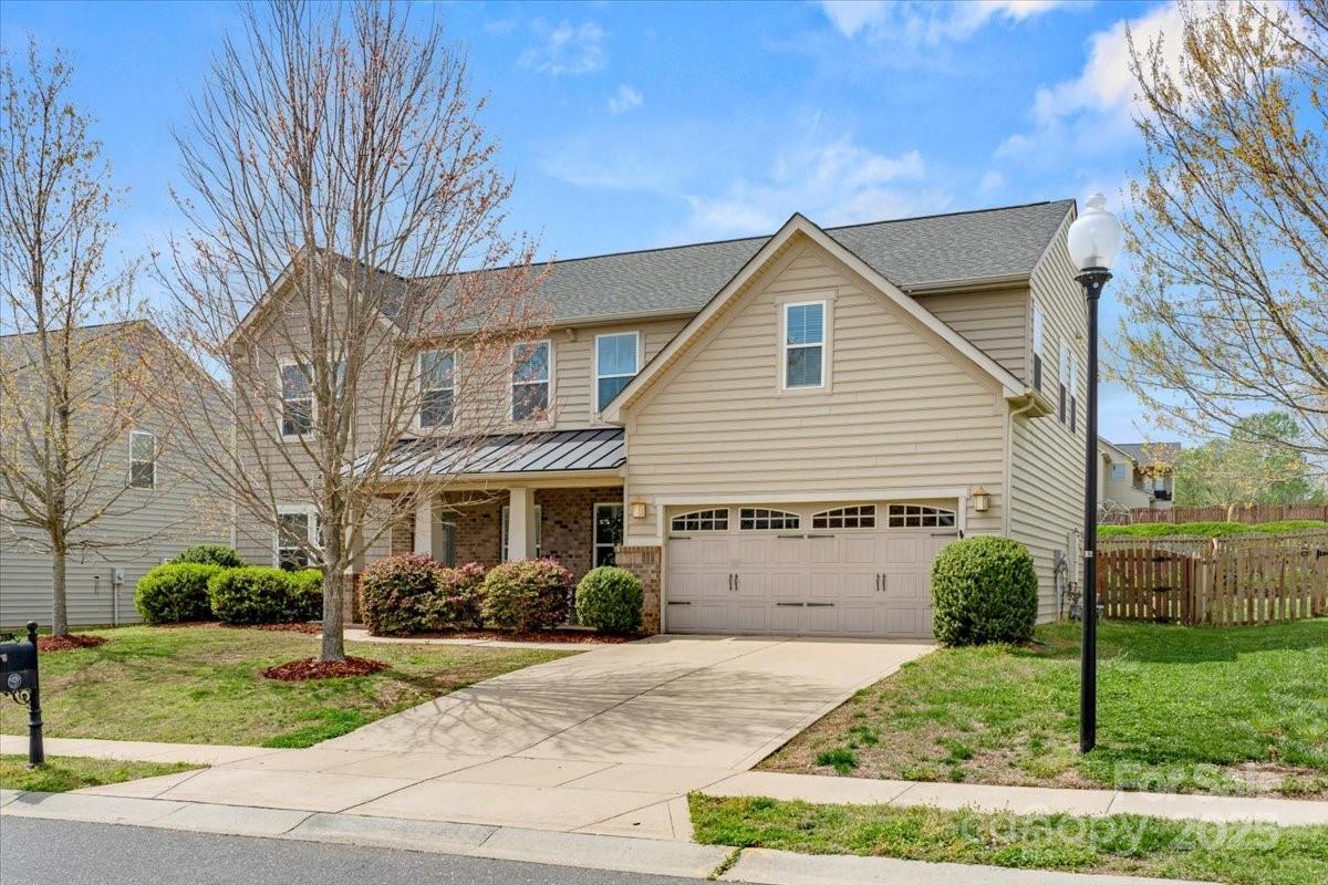 2065 Taney Way Indian Land, SC 29707 - Photo 1 of 43 a view of a house with a yard and large trees
