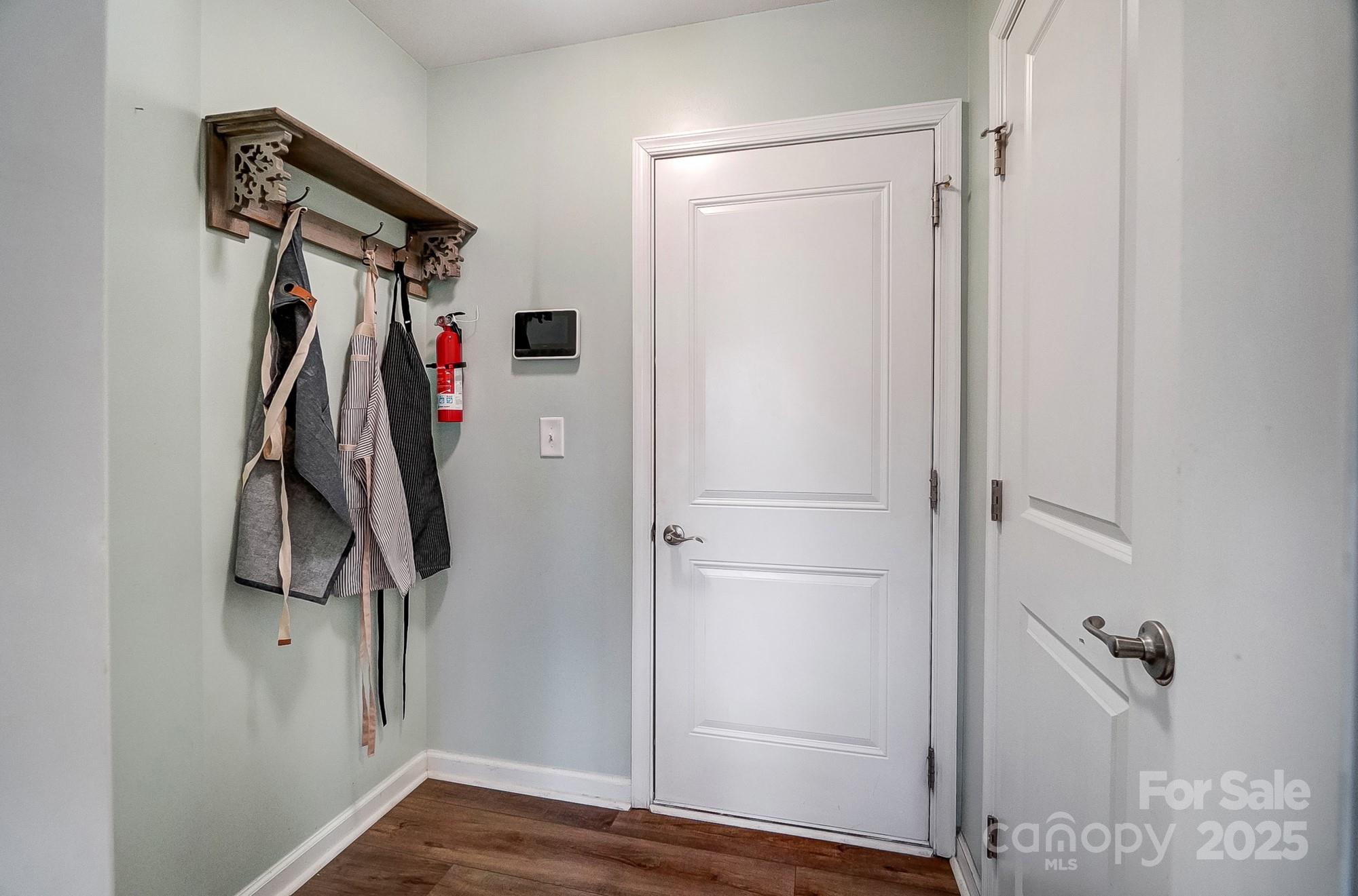 2065 Taney Way Indian Land, SC 29707 - Photo 16 of 43 a walk in closet with wooden floor